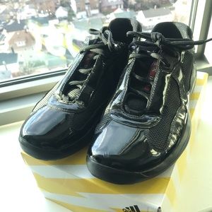 Prada World Cup in all black patent leather